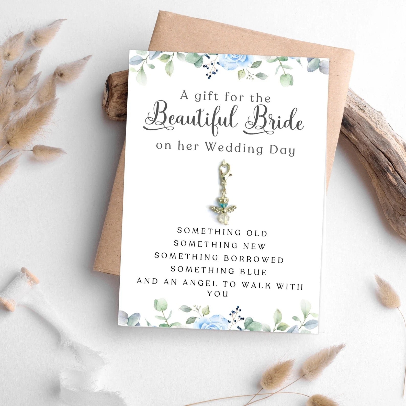 Angel charm on floral card