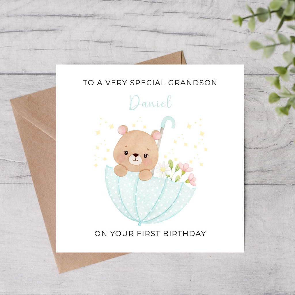 Birthday card for a very special grandson with a bear illustration and personalized text on a wooden surface.