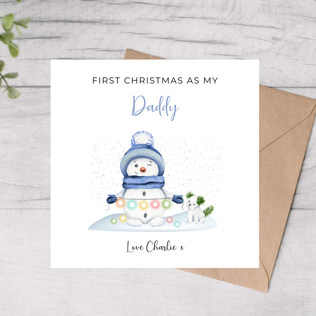 Christmas card with a snowman featuring text 'First Christmas as my Daddy'
