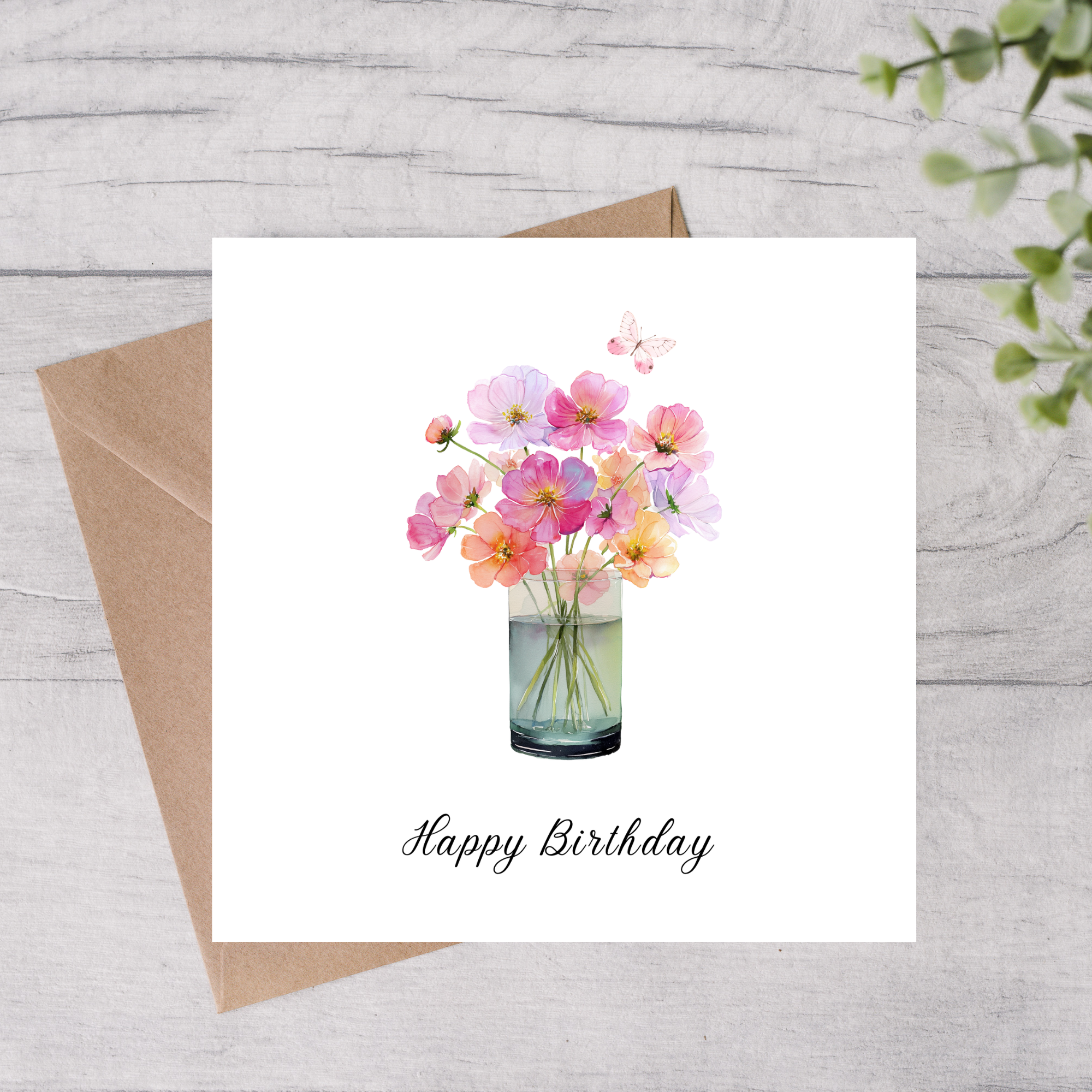 Birthday card with a bouquet of flowers and 'Happy Birthday' underneath