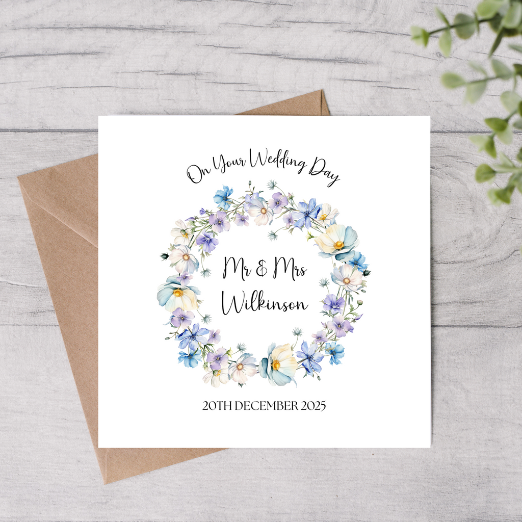 Wedding card floral design with personalised name and date 